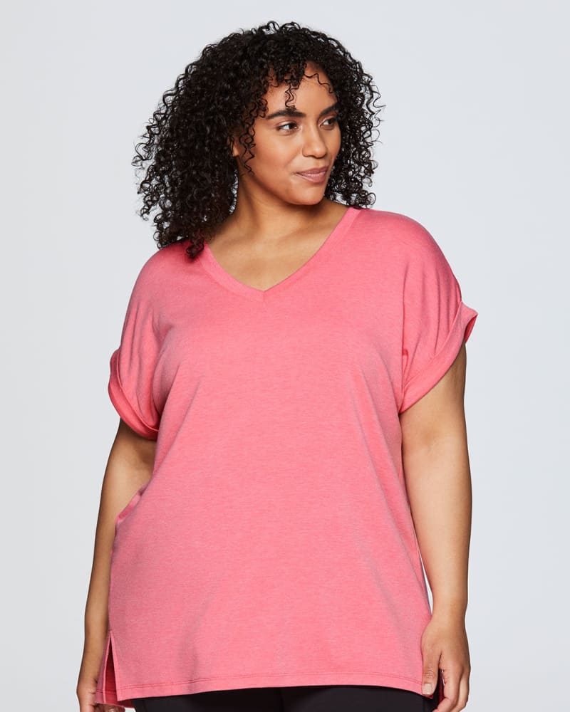 Front of a model wearing a size 3X Everyday V-neck Tunic in Pink by RBX Active. | dia_product_style_image_id:244688